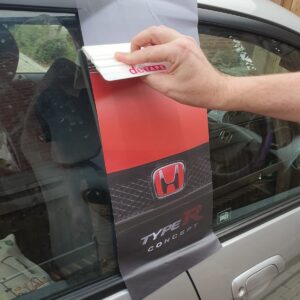 Fitting a B pillar custom any image sticker with a squeegee