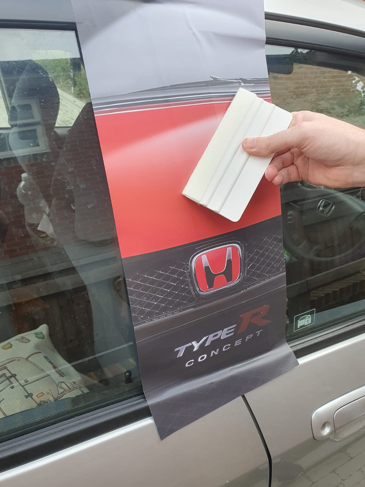 Fitting a B pillar custom any image sticker with a squeegee